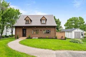This is a rare chance to own a stunning custom log home with 84 feet of private waterfront on the beautiful Ottawa River.