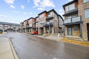 Welcome to 61 Soho Street, Unit 123, a beautifully crafted END UNIT freehold townhouse nestled in the highly desirable Central Park community !