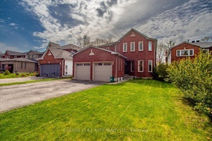 Here is your chance to own a large detached home in a family oriented neighbourhood, within proximity to schools, shopping, highway 400 and numerous parks !