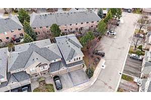 Rarely offered 2 storey end unit townhouse with double garage and fully fenced oversized backyard, offering a total living area of approx.