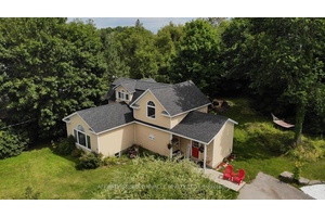 Gorgeous home with rustic charm and modern finishes on close to a half acre private lot in the quaint community of Norland in the Kawartha lakes.