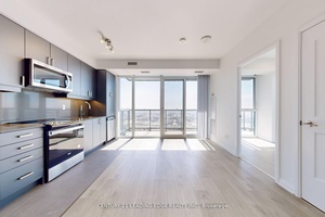 Welcome to 7895 Jane Street unit 2406, located on the 24th floor at The Met by Plazacorp.