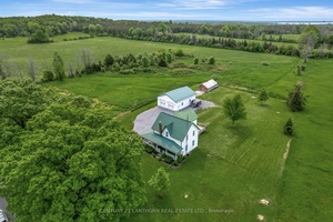 This spacious 4 bedroom, 2 bathroom farmhouse offers over 2, 200 sqft of living space on 4.