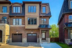 Welcome to this beautifully upgraded EXECUTIVE END UNIT TOWNHOME, offering 1, 900 SQ FT of thoughtfully designed living space on a SOUGHT AFTER PREMIUM LOT.