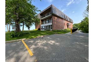 Affordable opportunity to own a 2 bedroom, 1 bath condo just steps from the waterfront !