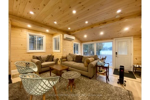 Stunning, fully rebuilt 4 season cottage on beautiful Lake just one hour from Highway 401 !