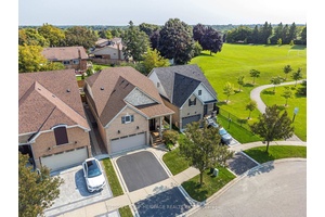 Welcome to this absolutely stunning 2 2 bedroom bungalow, nestled in one of the Whitby's most sought after high end neighbourhoods.