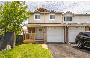 Welcome to this spacious and well maintained 4 bedroom, 2 bathroom end unit townhome, ideally situated on a rare pie shaped lot with a large, private yard and a wraparound ...