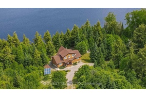 Absolutely Stunning Custom Built Four Season Lakeside Home Cottage One of the Most Beautiful Properties in the Barry's Bay Area Set on a private, tree lined lot along the shores ...