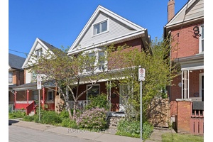 Spacious 1, 676 sq ft brick home with 5 bedrooms, 2 bathrooms, and a functional layout full of potential.