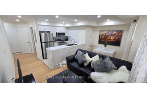 Beautifully Maintained One Bedroom Stacked Condo Town House In Sought After Area.