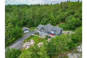 Welcome to 39 Big Sound Road a bright, spacious home with sweeping views of Georgian Bay.