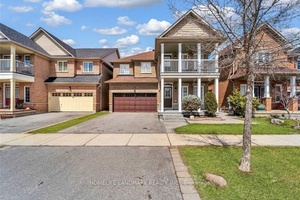 Stunning renovated detached home offering over 2, 900 sq ft of elegant living space with 4 large bedrooms, 2.