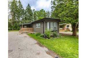 Welcome to Maple Lake ! This charming and easy to maintain home is located in a quiet and friendly park, offering a serene lifestyle with minimal upkeep.