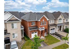 Welcome to this exquisite, well maintained detached home, showcasing timeless red brick elevation and curb appeal in one of Milton's most desirable, family friendly neighborhoods.
