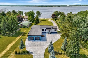 Welcome to 2528 County Road 3 a stunning, newly built waterfront home completed in 2025, offering over 144 feet of private shoreline on the Bay of Quinte and set on ...