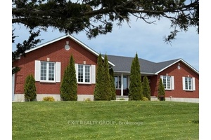 A beautiful, spacious home nestled into almost 90 acres just north of Belleville.