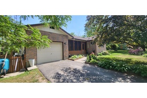 All brick, spacious country bungalow sitting on a picturesque lot just 3 minutes to Picton.