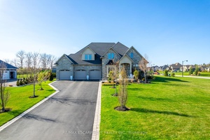 This exquisite custom built residence showcases refined elegance across 6 bedrooms and 7 bathrooms, set on a professionally landscaped 1 acre lot in a prestigious enclave of homes.