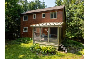 Fully furnished open concept western exposure 4 season cottage on 1.