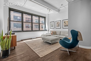 Welcome to luxury living in the heart of Manhattan at 335 West 38th Street, Unit 6.