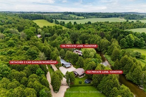 Exceptional property with two homes and a detached garage nestled on 379 feet along the Saugeen River.