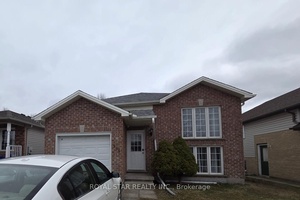 Lovely Raised BUNGALOW with several updates throughout, newly painted.