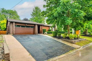 Welcome to 65 Hillcrest Avenue, a beautifully renovated bungalow in the heart of St.