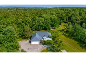 This versatile bungalow on a scenic 7 acre property is perfect for investors or a multi family living.