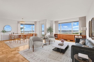 Experience panoramic river views from this this corner two bedroom, two and a half bath Upper West Side apartment.