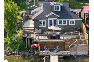 Waterfront, All season Living is calling from the shores of Lake Scugog in this warm and welcoming 4 bedroom retreat nestled in the heart of the Williams Point community.