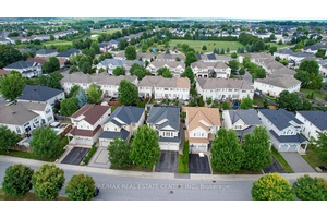 Welcome To 544 Ravendale Way, A Beautifully Maintained Family Home Nestled In The Heart Of Barrhavens Prestigious Stonebridge Golf Course Community A Neighborhood Known For Its Tree Lined Streets, Top ...