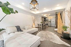This sleek 2 bedroom plus den, 3 bathroom townhouse in the Junction Triangle blends design forward details with everyday function.