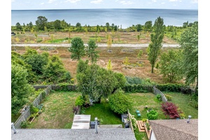 Proudly Owned By The Original Family, This Well Kept 3 1 Bedroom, 3 Washroom Semi Detached Home Combines Comfort, Thoughtful Updates, And Rare Permanent Lake Views From The Backyard.