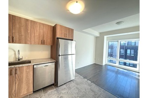 This modern townhouse offers 2 bedrooms and 2 bathrooms, designed with a bright and airy layout.