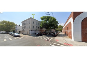 Renovated Corner 2 Family mixed use home with a 2, 500 SF store.