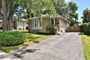 All Brick Bungalow Located on a Quiet and Family Safe Street, features a Separate Entrance to a 2 Bed In Law Suite and has a Private and Spacious Backyard.