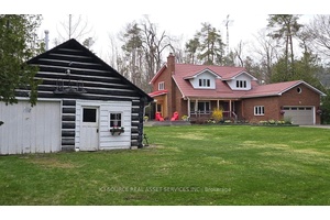 Private Woodland Retreat With Lake Views on Prestigious Brambel Rd.