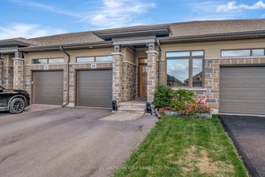 Welcome to 90 Covington. This townhome bungalow offers a very desirable layout.