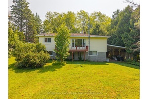 Enjoy this 4 season cottage year round on a municipal paved road.