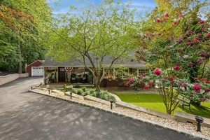 Meticulously updated historic farm ranch blending timeless charm with modern elegance.