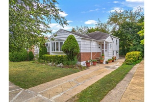 Welcome to 1302 E 101st Street, a Charming Single Family Home !