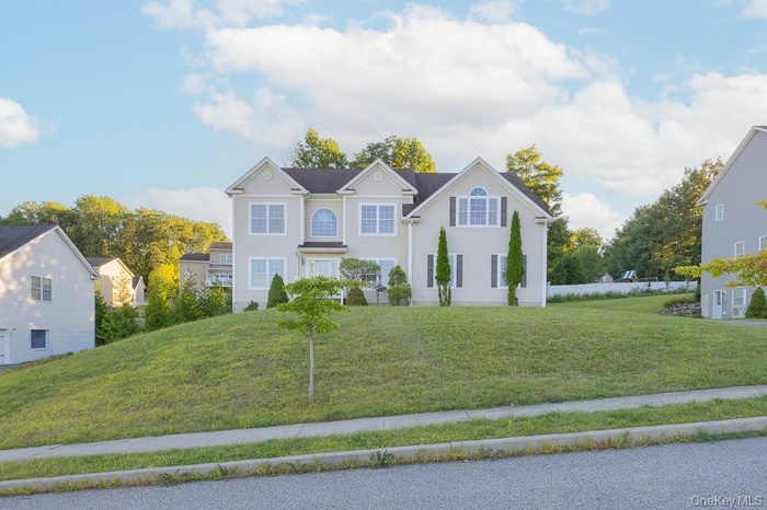 View of front of home with a front lawn