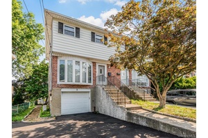 Sun filled townhouse style home offering space, comfort, and convenience.