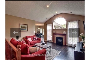 A SPACIOUS ALL BRICK BUNGALOW LOCATED IN COUNTRYSIDE OFFERS A LIFESTYLE OF SOPHISTICATION AND CONVENIENCE.
