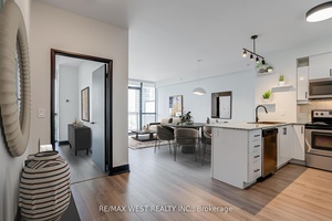 Exceptionally Bright Condo with Spacious Low Floor Living and a Generous Balcony !