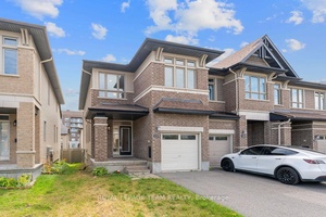 A rare find in Barrhaven Discover the perfect harmony of space, style, and sophistication in this striking Richcraft end unit townhome.