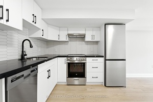 Step into this fully renovated split level unit that combines modern updates with a unique layout full of charm and character.