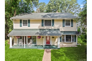 Welcome to 74 Tuscarora Drive in the charming community of Centerport, NY.