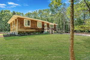 Hampton Bays Raised Ranch on Expansive 1.